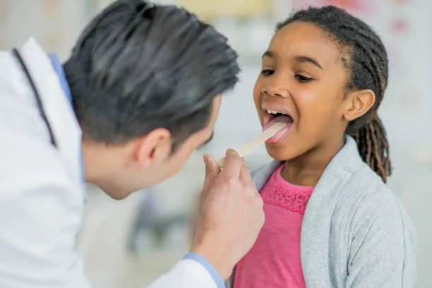 dentist checking tongue